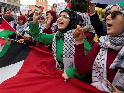 Pro-Palestinian protesters wave Palestinian flags and chant slogans against the US and Israel on December 10, 2017 during a demonstration in Rabat against US President Donald Trump's declaration of Jerusalem as Israel's capital. (Photo by FADEL SENNA / AFP)